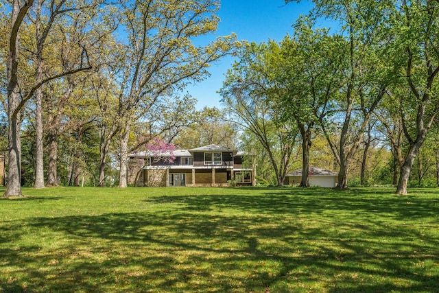 1N341 Indian Knoll Rd, West Chicago, IL 60185 - view of grassy yard with a wooden deck