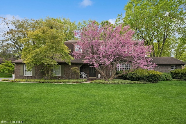 403 Minnaqua Dr, Prospect Heights, IL 60070 - view of front facade with a front yard and brick siding