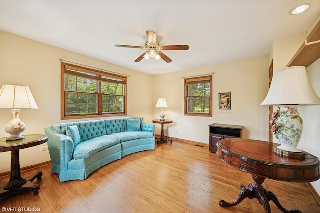 403 Minnaqua Dr, Prospect Heights, IL 60070 - living area featuring ceiling fan, healthy amount of natural light, wood finished floors, and baseboards