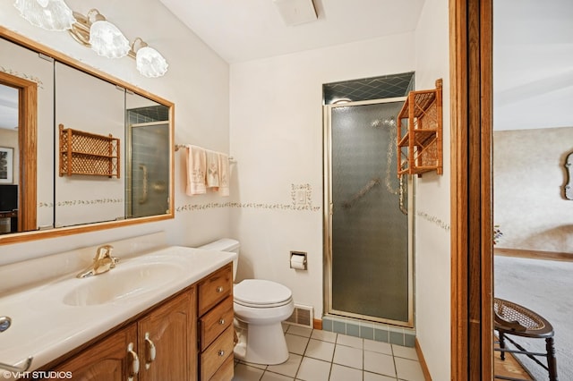 403 Minnaqua Dr, Prospect Heights, IL 60070 - full bathroom featuring a shower stall, tile patterned flooring, vanity, toilet, and baseboards