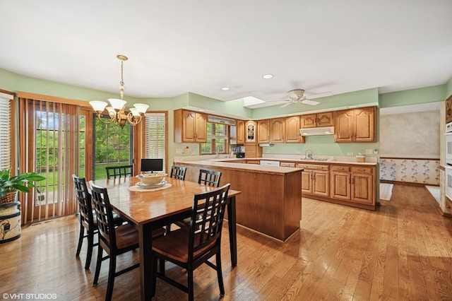 403 Minnaqua Dr, Prospect Heights, IL 60070 - dining space featuring light wood-style flooring, ceiling fan, a chandelier, baseboards, and recessed lighting