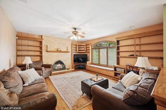 403 Minnaqua Dr, Prospect Heights, IL 60070 - living room featuring a fireplace, a ceiling fan, wood finished floors, and built in features