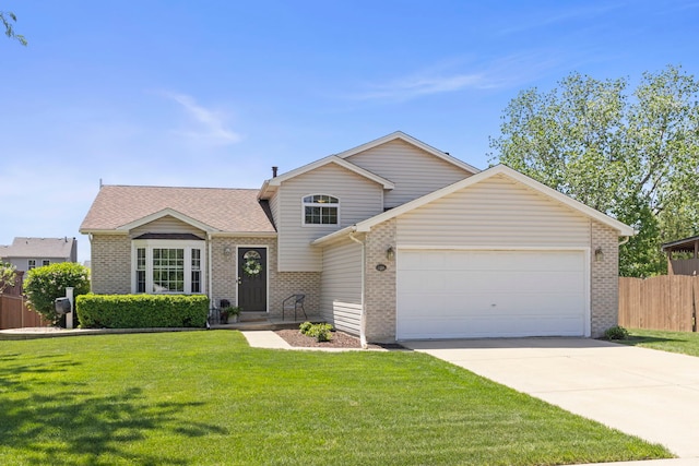 5306 Whisper Meadow Ct, Plainfield, IL 60586 - tri-level home featuring brick siding, a garage, driveway, and roof with shingles
