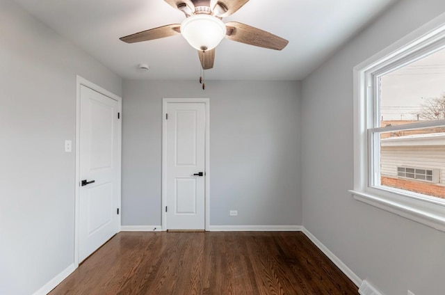 126 Strieff Ave, Chicago Heights, IL 60411 - unfurnished bedroom with wood finished floors, baseboards, and a ceiling fan