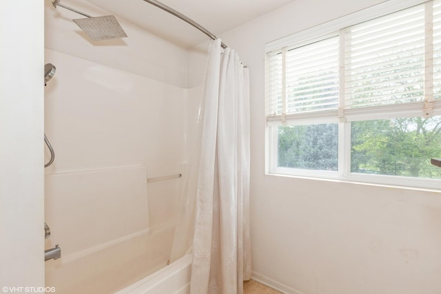 554 Truman Dr, Oswego, IL 60543 - bathroom with shower / bath combo and healthy amount of natural light
