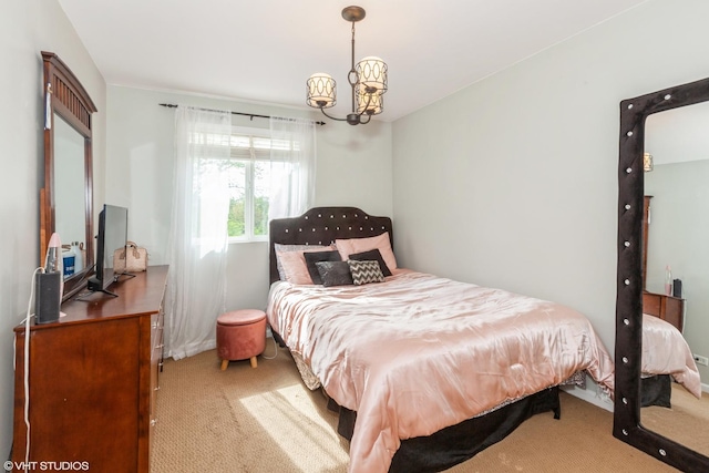 554 Truman Dr, Oswego, IL 60543 - carpeted bedroom featuring a chandelier
