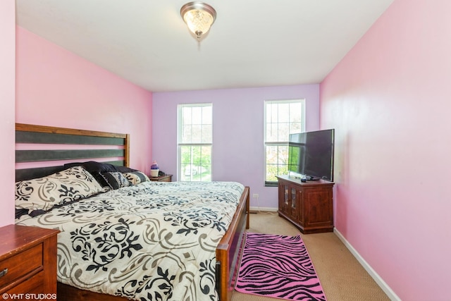 554 Truman Dr, Oswego, IL 60543 - bedroom featuring light colored carpet and baseboards