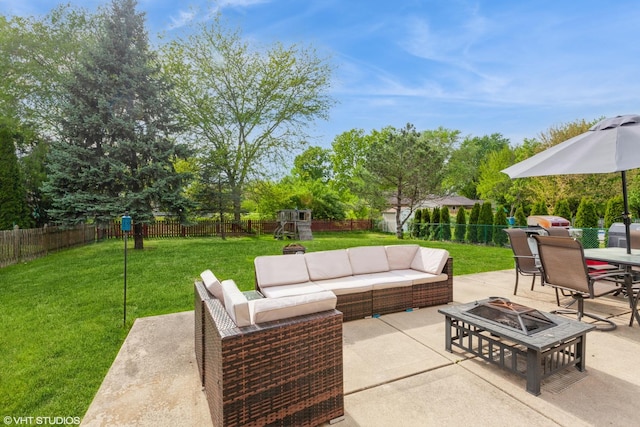554 Truman Dr, Oswego, IL 60543 - view of patio with a playground, an outdoor living space with a fire pit, and outdoor dining space