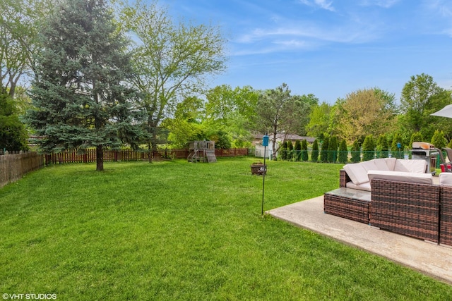 554 Truman Dr, Oswego, IL 60543 - view of yard featuring a playground, outdoor lounge area, a patio, and view of wooded area