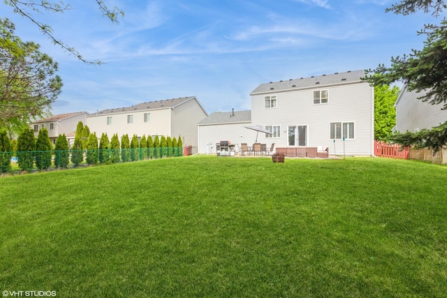 554 Truman Dr, Oswego, IL 60543 - rear view of house with a patio