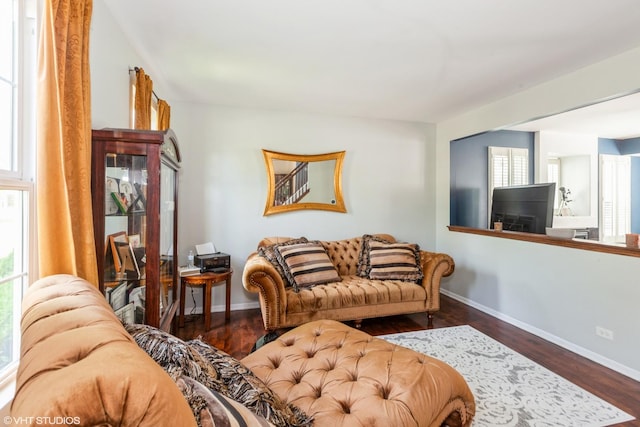 554 Truman Dr, Oswego, IL 60543 - living room featuring baseboards and wood finished floors