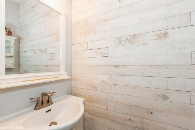 554 Truman Dr, Oswego, IL 60543 - bathroom with a sink and wooden walls