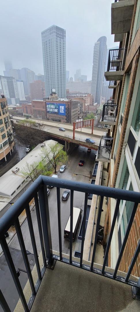 balcony featuring a city view