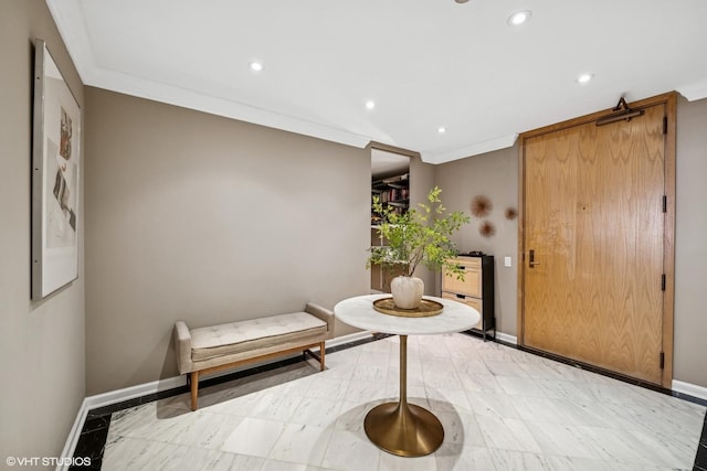 living area with baseboards, recessed lighting, and crown molding