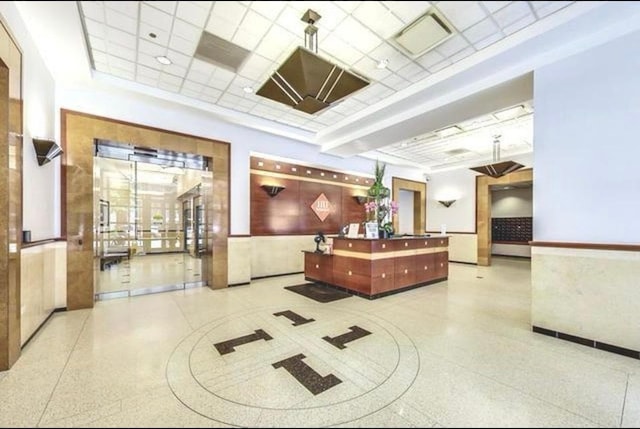 reception featuring wainscoting