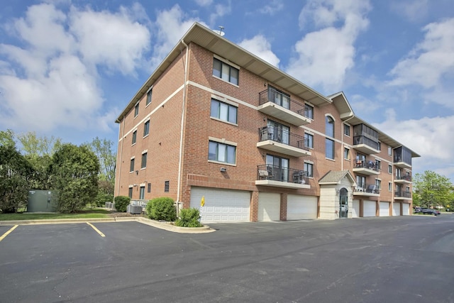 6850 W Winding Trl Unit 406, Oak Forest, IL 60452 - view of apartment building / complex with central AC unit