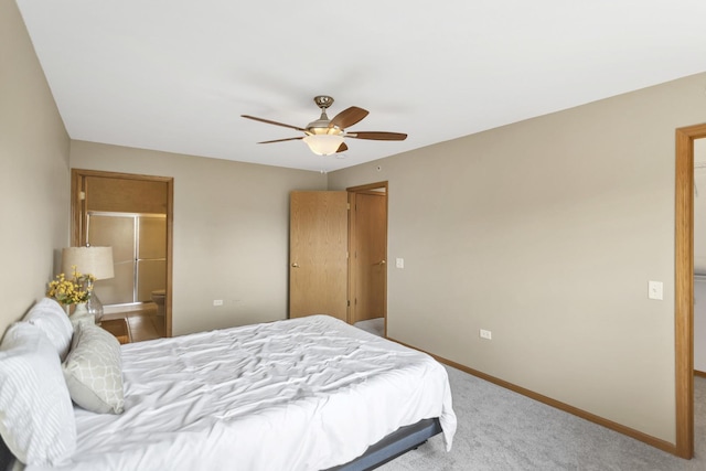 6850 W Winding Trl Unit 406, Oak Forest, IL 60452 - carpeted bedroom featuring baseboards, a ceiling fan, and ensuite bath