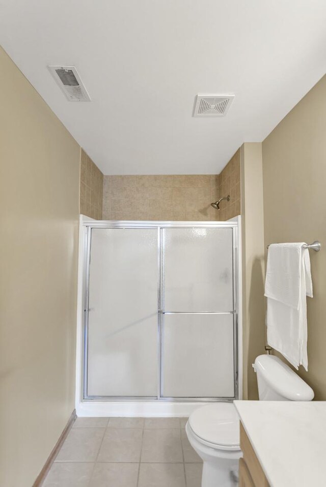 6850 W Winding Trl Unit 406, Oak Forest, IL 60452 - bathroom with toilet, tile patterned flooring, a shower stall, and vanity