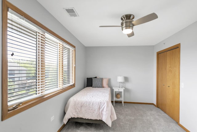 6850 W Winding Trl Unit 406, Oak Forest, IL 60452 - bedroom featuring light carpet, baseboards, a closet, and a ceiling fan