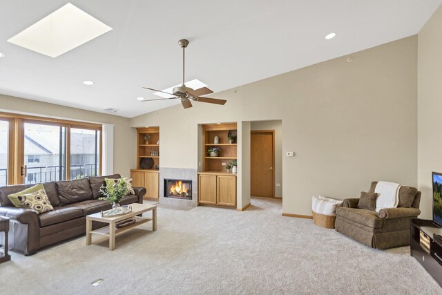 6850 W Winding Trl Unit 406, Oak Forest, IL 60452 - living room featuring light colored carpet, a skylight, a tiled fireplace, recessed lighting, and baseboards