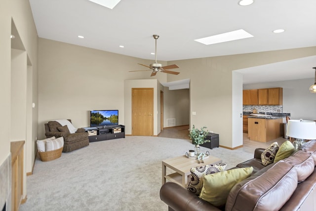 6850 W Winding Trl Unit 406, Oak Forest, IL 60452 - living room featuring a skylight, light colored carpet, recessed lighting, lofted ceiling, and ceiling fan
