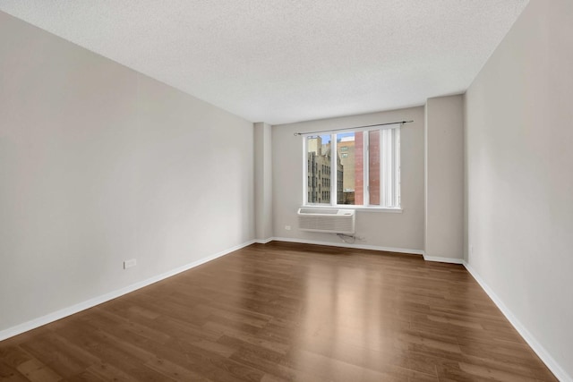 801 S Plymouth Ct Unit 711, Chicago, IL 60605 - spare room featuring wood finished floors, a textured ceiling, and baseboards