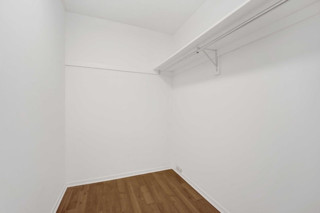 801 S Plymouth Ct Unit 711, Chicago, IL 60605 - spacious closet featuring dark wood-style floors