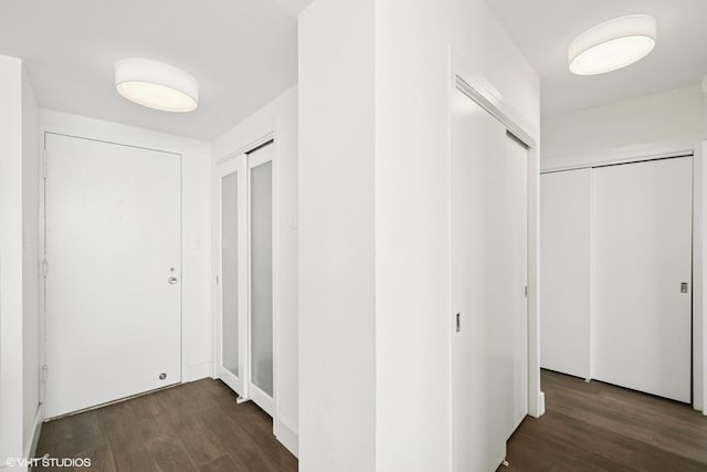 corridor with wood finished floors
