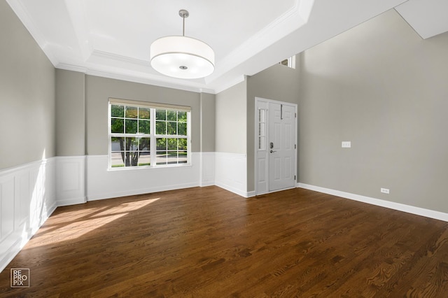 11911 Winterberry Ln, Plainfield, IL 60585 - spare room with a raised ceiling, ornamental molding, and wood finished floors