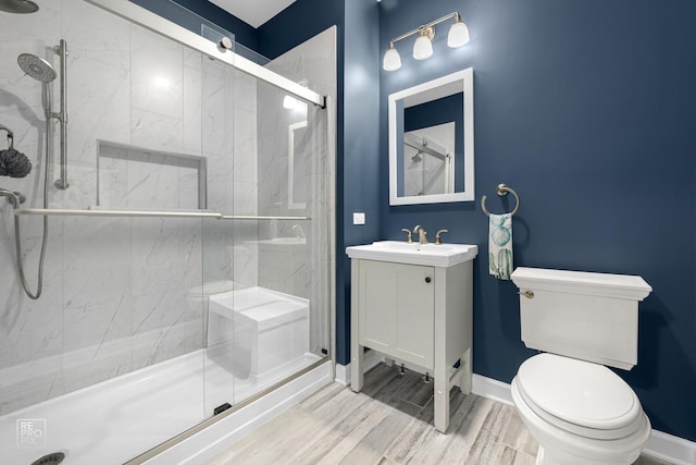 11911 Winterberry Ln, Plainfield, IL 60585 - full bath featuring toilet, a stall shower, vanity, and baseboards