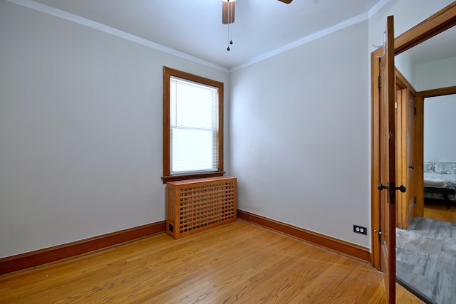 6211 W School St, Chicago, IL 60634 - empty room with light wood-type flooring, baseboards, ceiling fan, and crown molding
