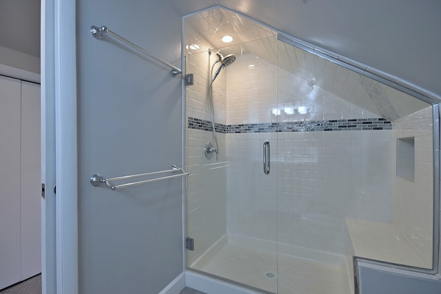 6211 W School St, Chicago, IL 60634 - bathroom featuring a stall shower and baseboards