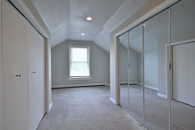 6211 W School St, Chicago, IL 60634 - additional living space with baseboard heating, carpet, vaulted ceiling, baseboards, and recessed lighting