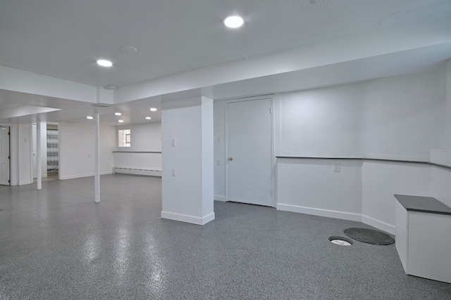6211 W School St, Chicago, IL 60634 - finished basement featuring baseboard heating, recessed lighting, and baseboards