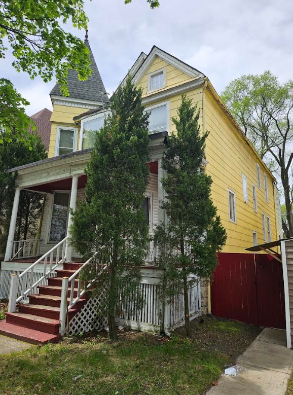6550 S Stewart Ave, Chicago, IL 60621 - view of front of home featuring a porch and stairs