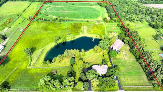 8311 Haligus Rd, Huntley, IL 60142 - aerial view of sparsely populated area featuring property boundaries highlighted and a large body of water
