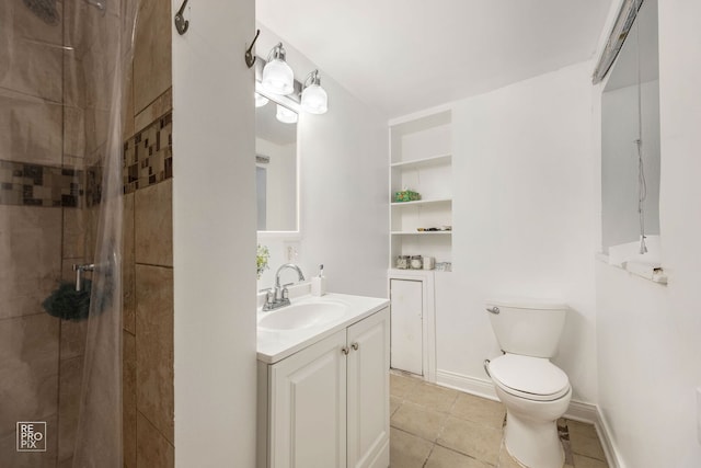 bathroom with a stall shower, tile patterned flooring, toilet, and vanity