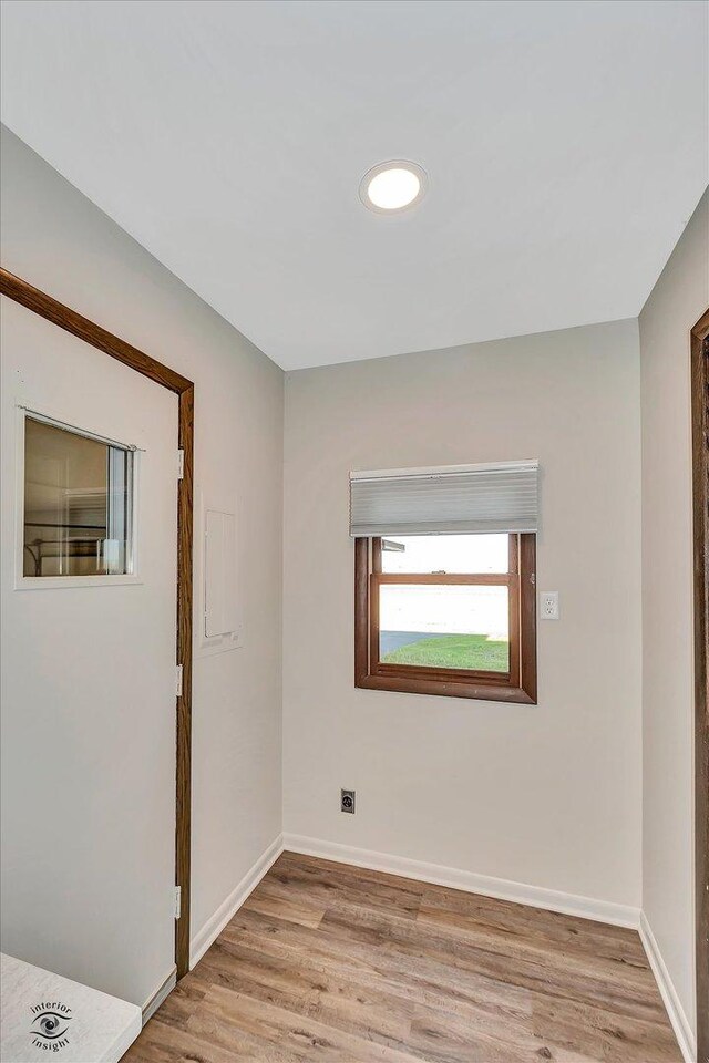 2958 N 1100 E Rd, Clifton, IL 60927 - unfurnished room with light wood-style floors and baseboards