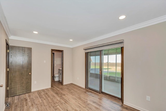 2958 N 1100 E Rd, Clifton, IL 60927 - unfurnished bedroom featuring access to exterior, baseboards, ornamental molding, light wood-type flooring, and recessed lighting