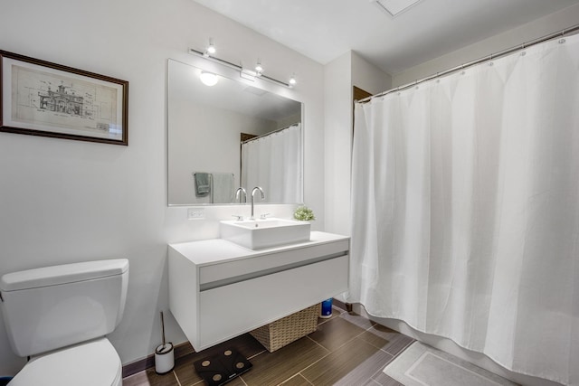 1345 S Wabash Ave Unit 710, Chicago, IL 60605 - full bathroom with toilet, vanity, and wood tiled floors