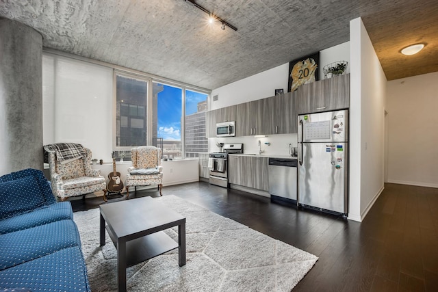 1345 S Wabash Ave Unit 710, Chicago, IL 60605 - living room with dark wood-style floors and baseboards