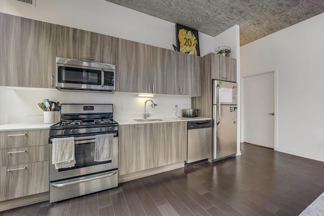 1345 S Wabash Ave Unit 710, Chicago, IL 60605 - kitchen featuring stainless steel appliances, modern cabinets, a sink, and light countertops