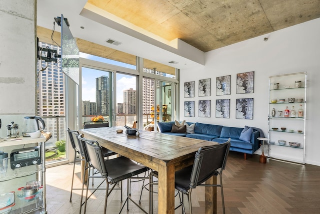 dining area featuring a view of city