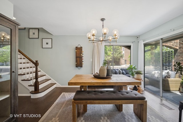 921 Harlem Ave Unit 1, Glenview, IL 60025 - dining space featuring a chandelier, wood finished floors, stairs, and baseboards