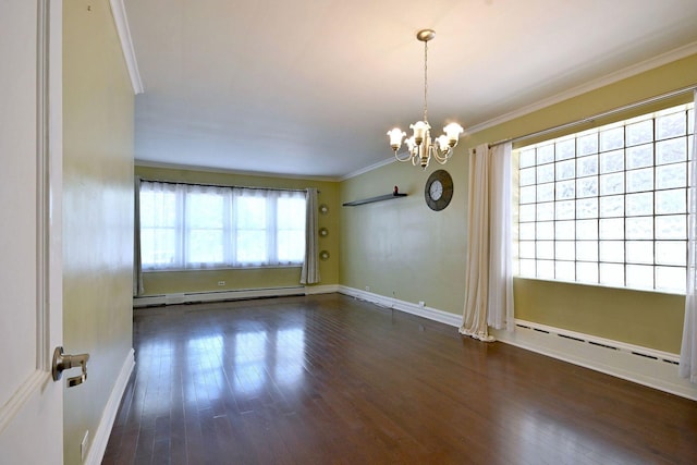 spare room with a baseboard radiator, crown molding, hardwood / wood-style flooring, a chandelier, and baseboards