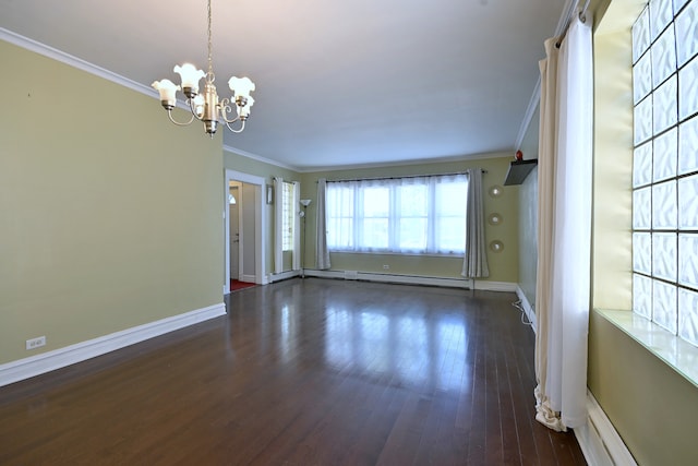 spare room with a baseboard heating unit, ornamental molding, dark wood-style floors, a chandelier, and baseboards