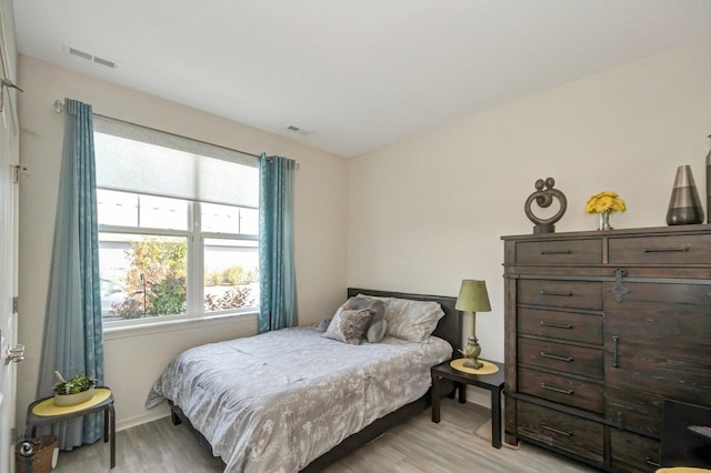 6359 Doral Dr, Gurnee, IL 60031 - bedroom featuring light wood-type flooring and baseboards