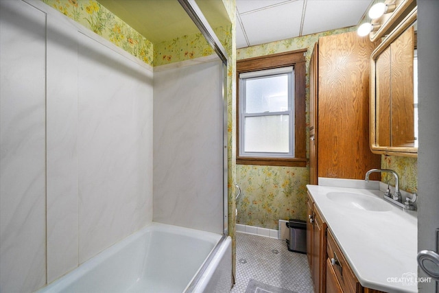 full bath with wallpapered walls, vanity, shower / bathtub combination, and tile patterned flooring