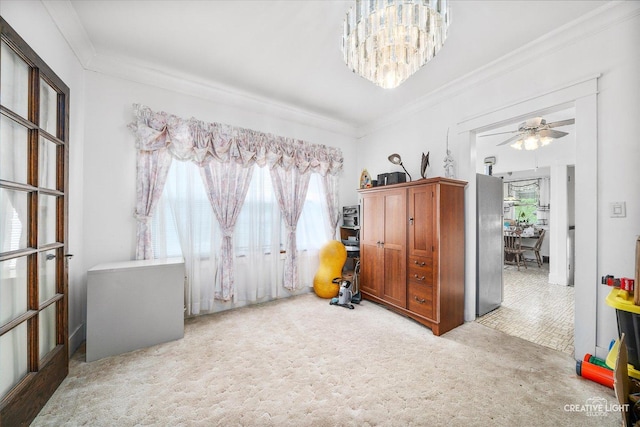 bedroom with carpet, ornamental molding, and a chandelier