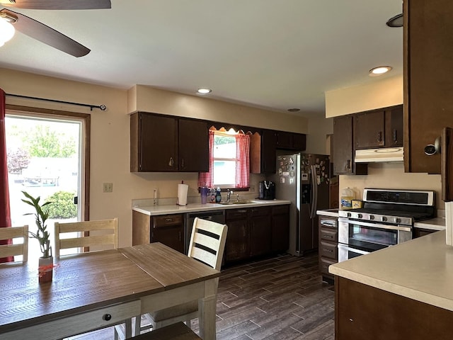758 Edwin Dr, Bourbonnais, IL 60914 - kitchen with stainless steel appliances, under cabinet range hood, light countertops, wood finish floors, and dark brown cabinetry